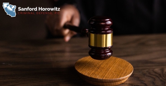 person holding a gavel