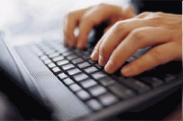 Man typing on keyboard